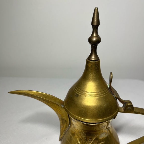 brass Dallah, which is a traditional Arabic coffee pot. - Picture 2 of 8